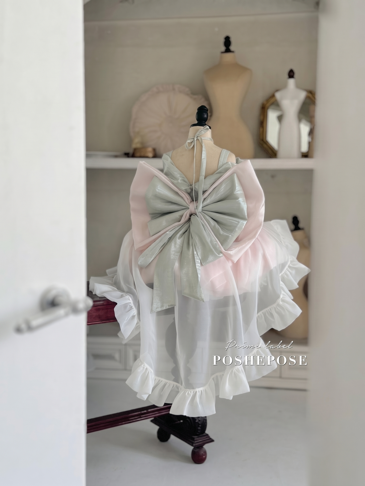Cherry Tea Princess Dress featuring a dramatic oversized pastel bow at the back