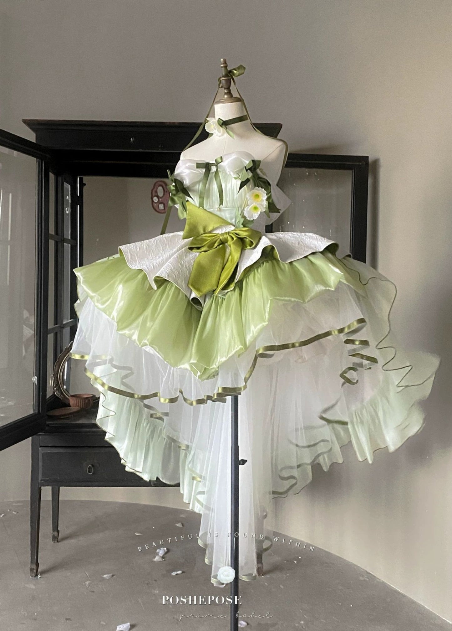 Beautiful Lily Aquarelle Dress by Posheposeglobal features soft pastel colours and romantic lace accents.
