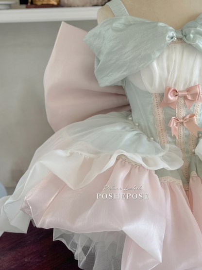 Sweet Lolita princess dress featuring mint green accents and pastel pink layers