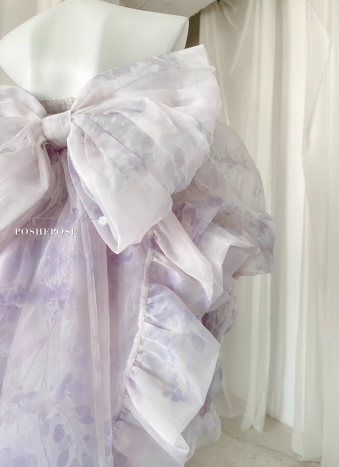 Back View of Lavender Floral Gown Featuring Statement Organza Bow and Ruffles - PoshePose Global