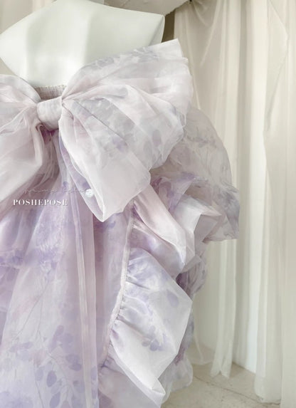 Back View of Lavender Floral Gown Featuring Statement Organza Bow and Ruffles - PoshePose Global