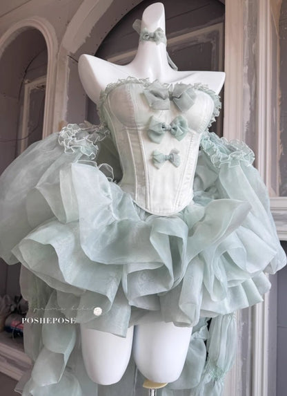 Front Angle of Mint Green Haute Couture Princess Gown with Corset and Voluminous Ruffled Skirt - PoshePose Global