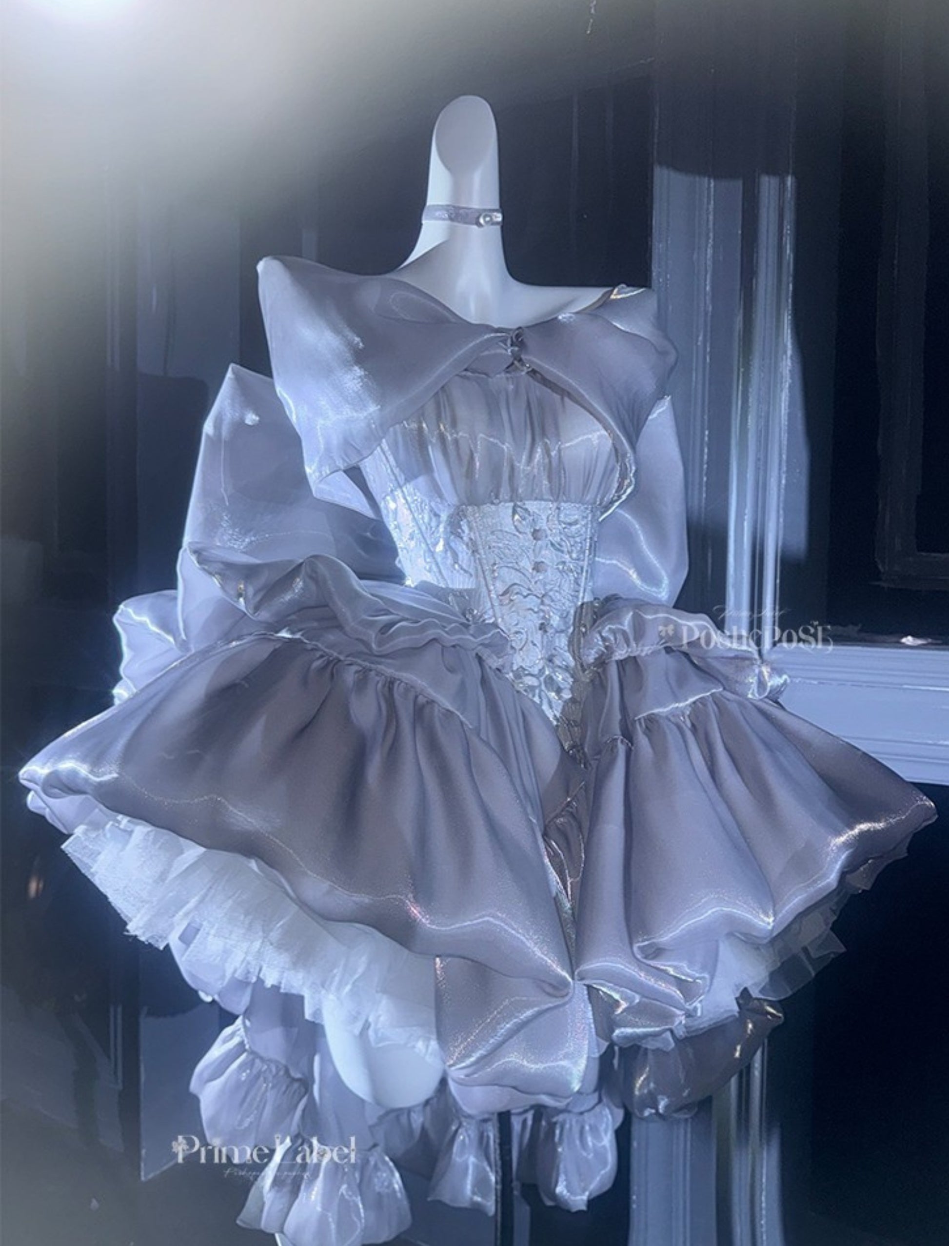 Balletcore silver dress featuring voluminous layers and soft gloss