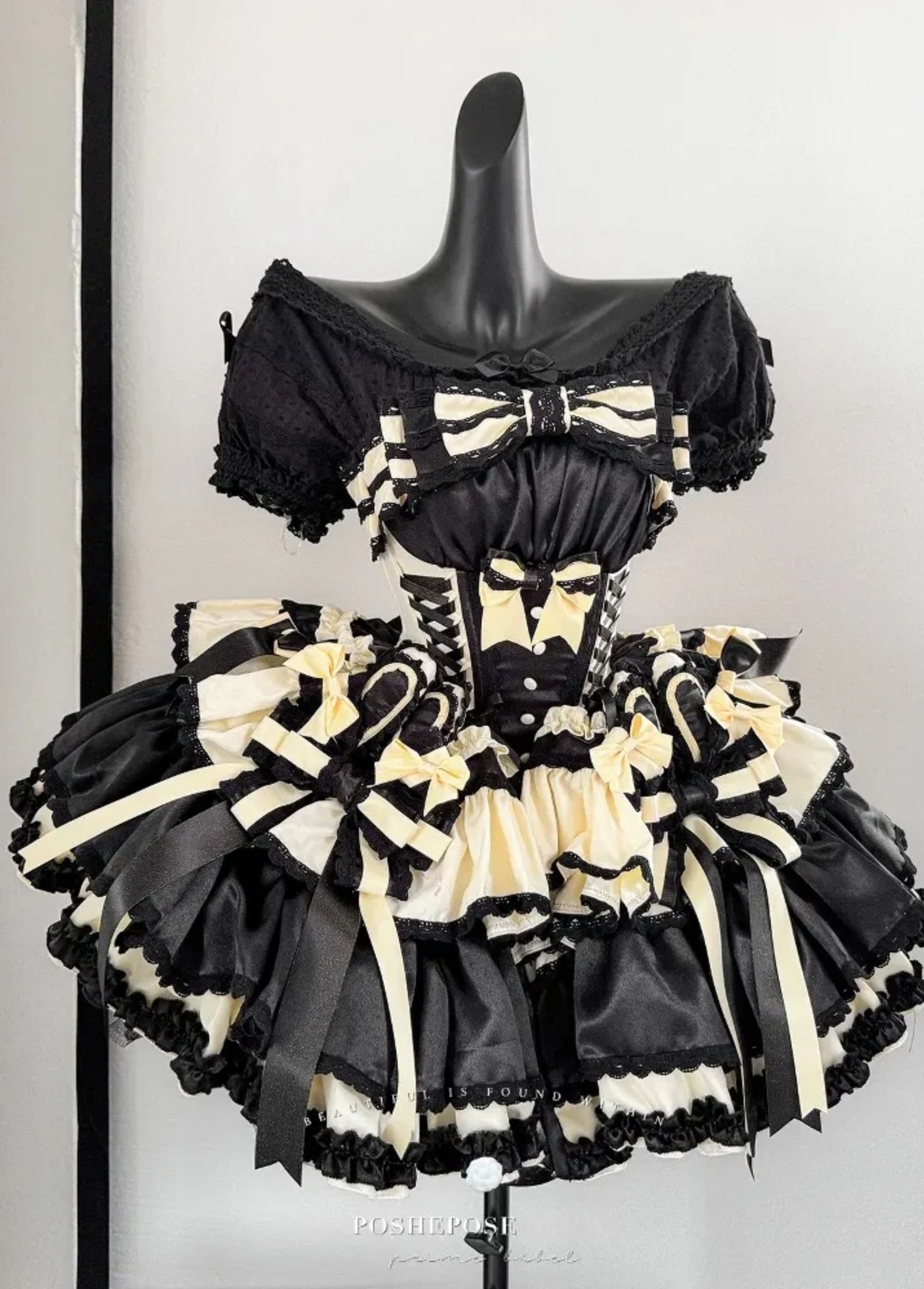 Yellow bow accents on Sweet Dream Black Dress, premium idol Lolita clothing design.