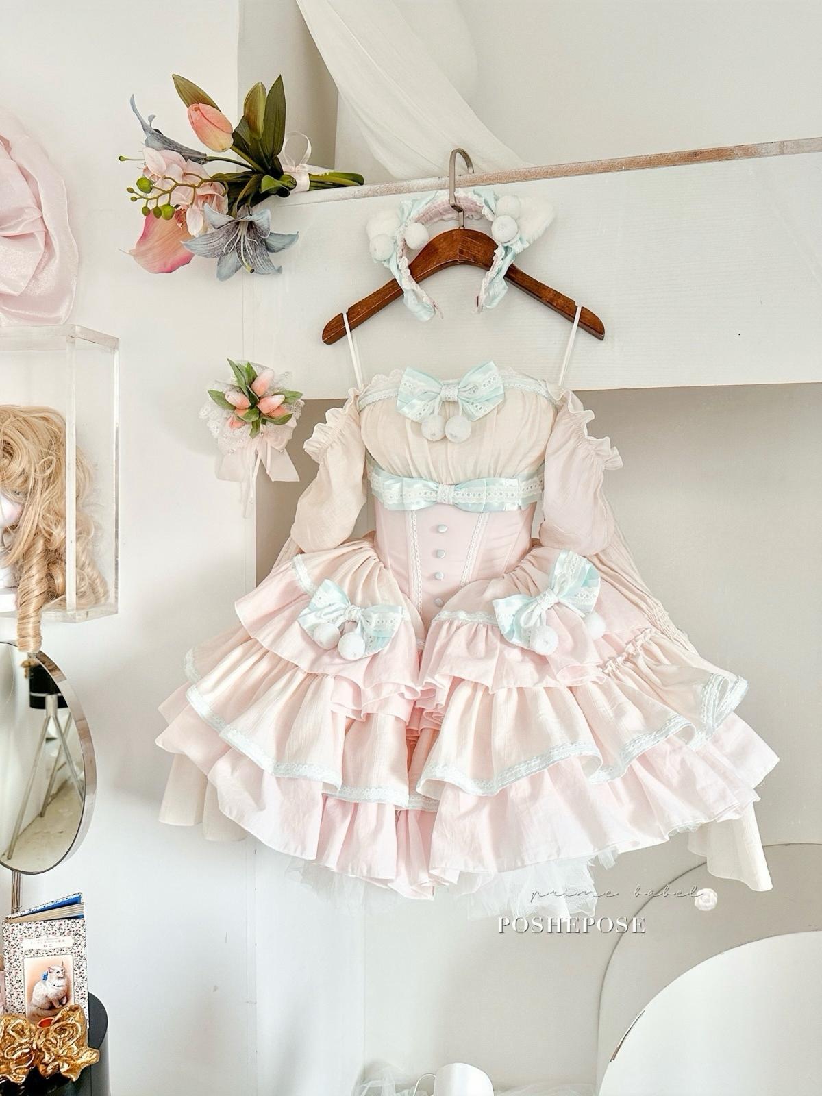 Elegant pastel lolita dress with mint bows, lace trimming, and heart-shaped details.