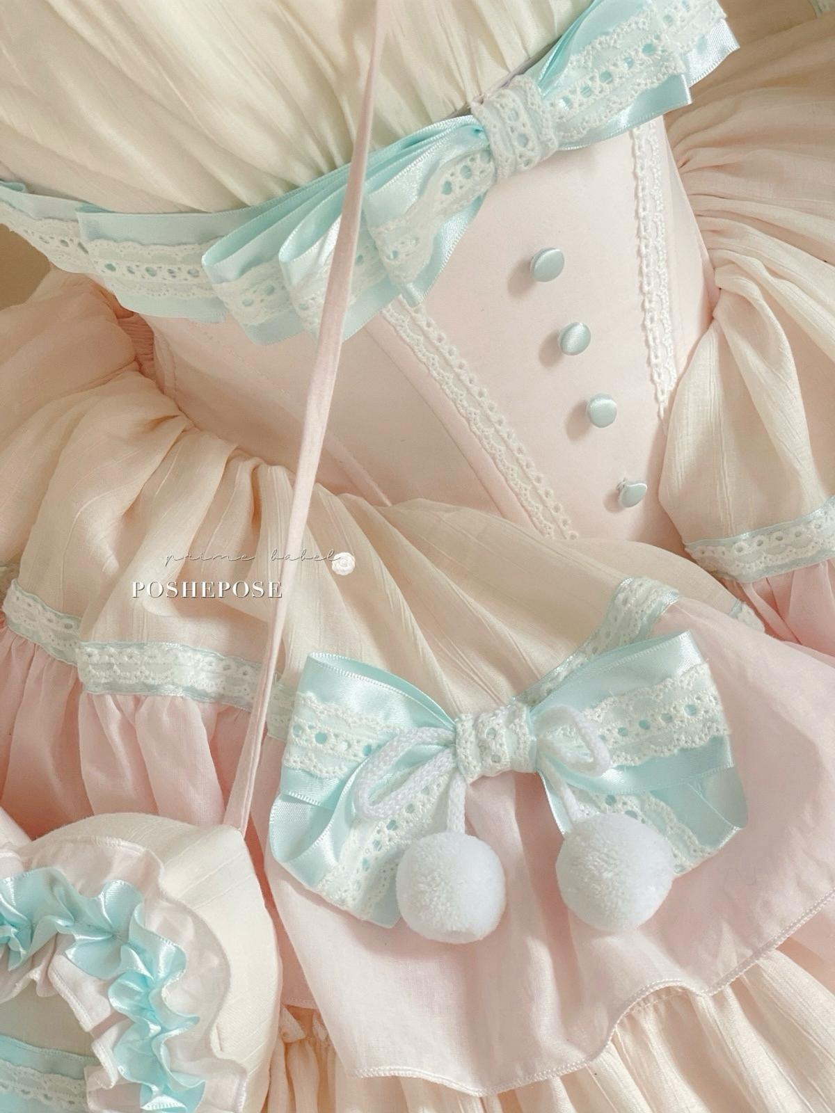 Fairycore mint lullababy dress with lace apron and pastel details by Poshepose Global.