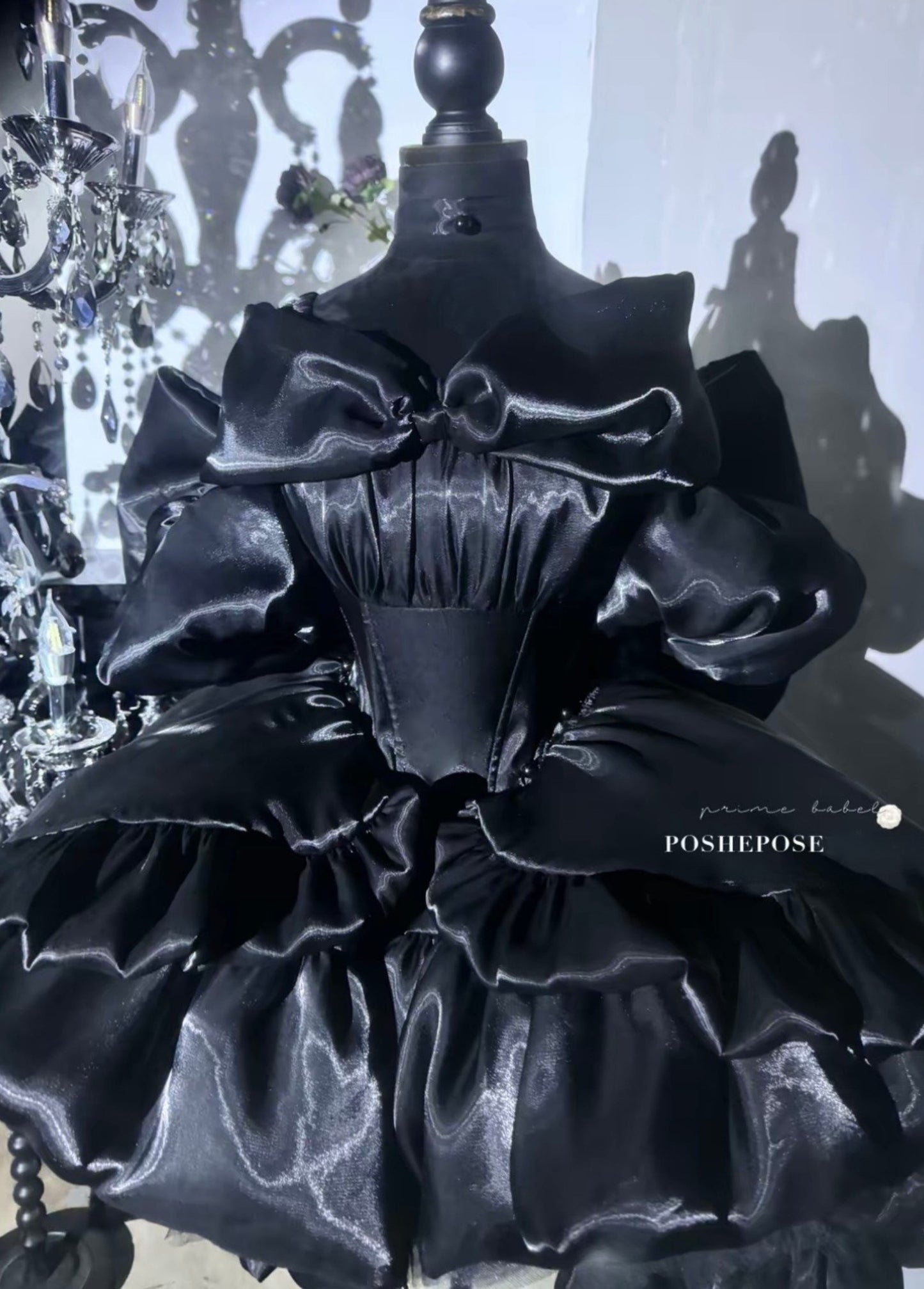 Cute and elegant Obsidian Princess Dress from Posheposeglobal has soft black ruffles and lovely details.