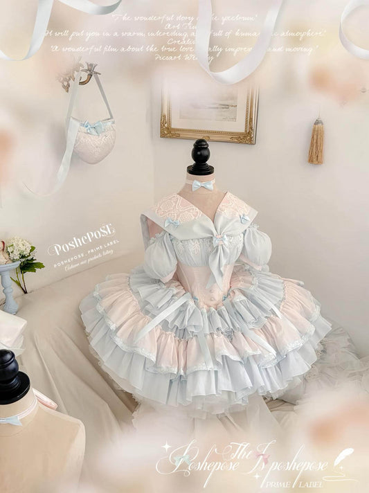 Gardenia Promise Vintage Dress by Poshepose Global in pastel pink and blue with lace sailor collar.