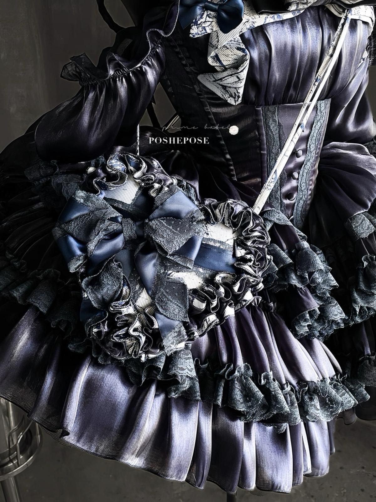 Handmade Rococo-style navy dress featuring layered ruffles and elegant lace.