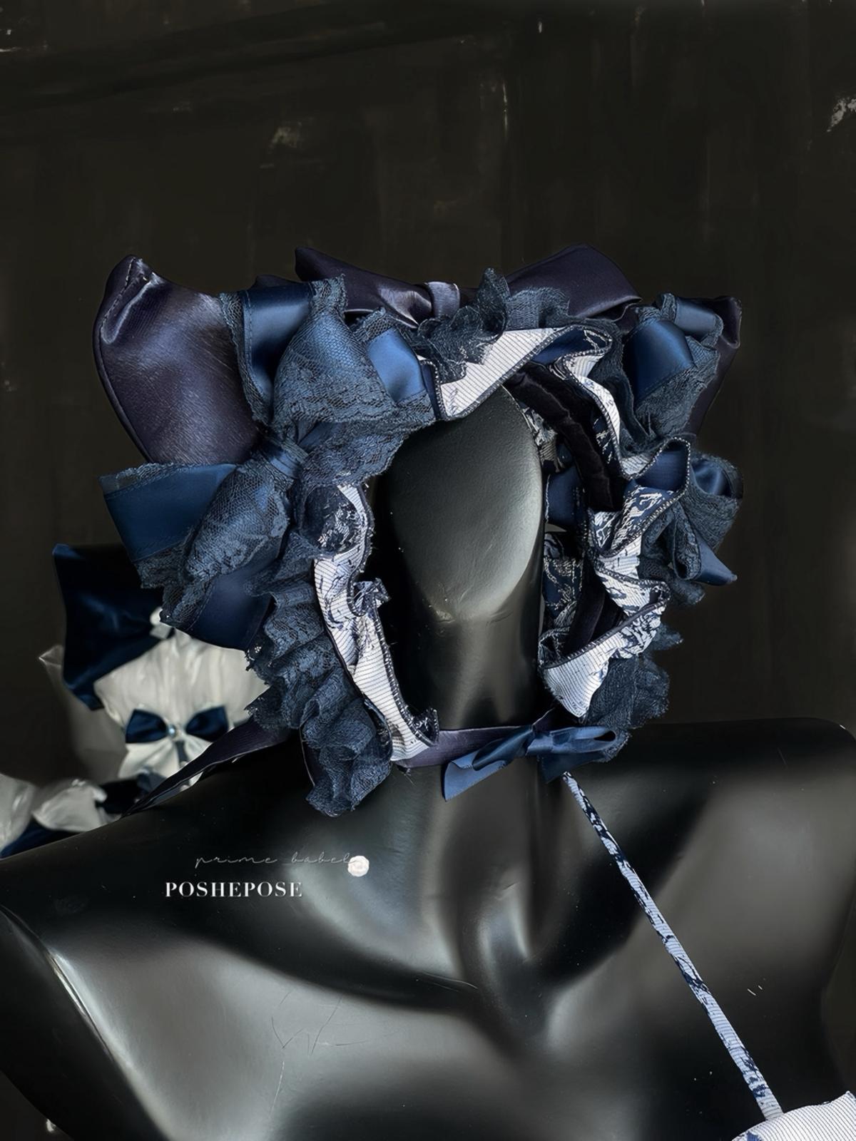 Poshepose Global luxury navy dress with heart purse and satin ribbons.