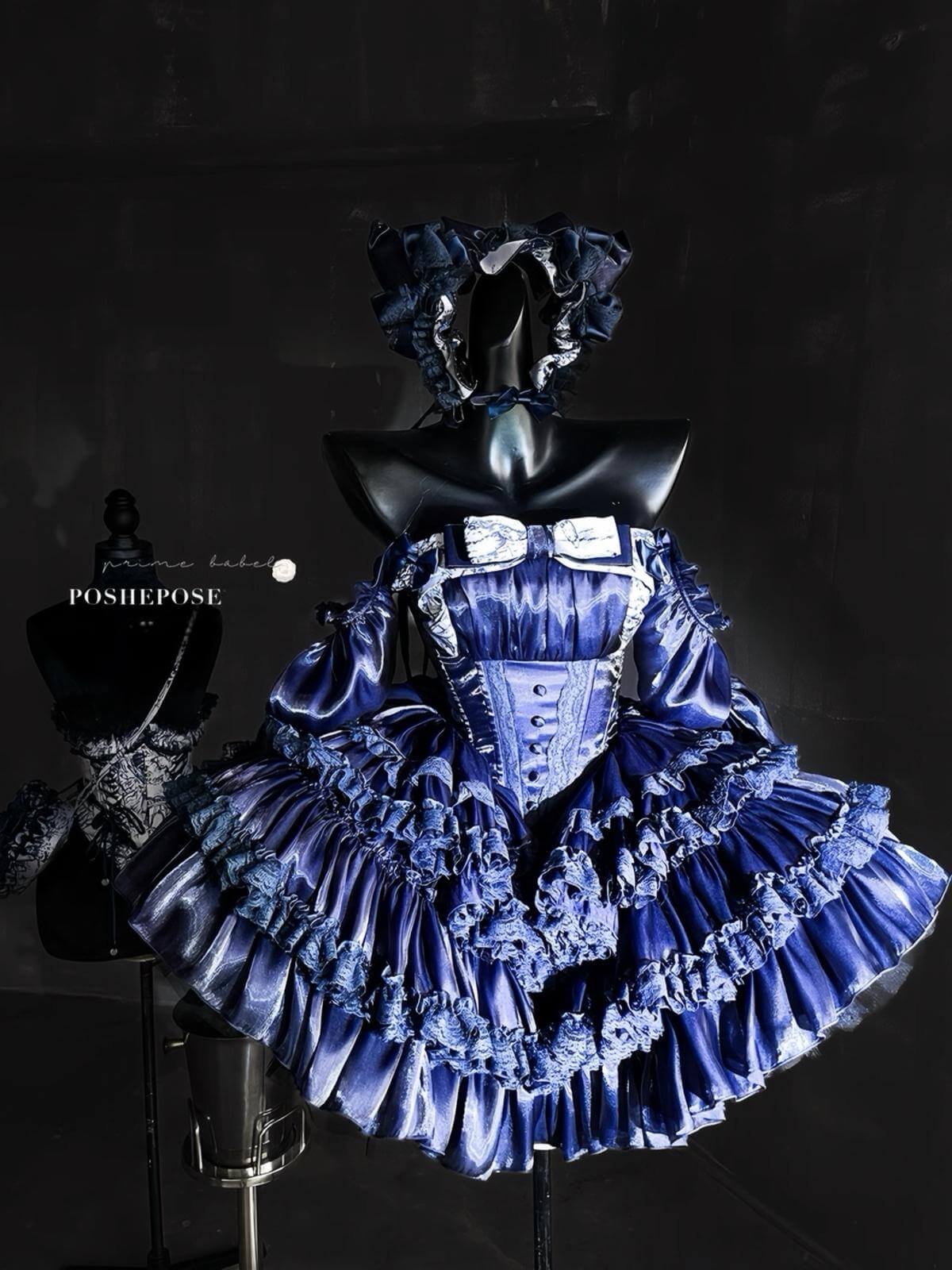 Deep navy satin lolita dress with baroque lace and heart bag accessory.
