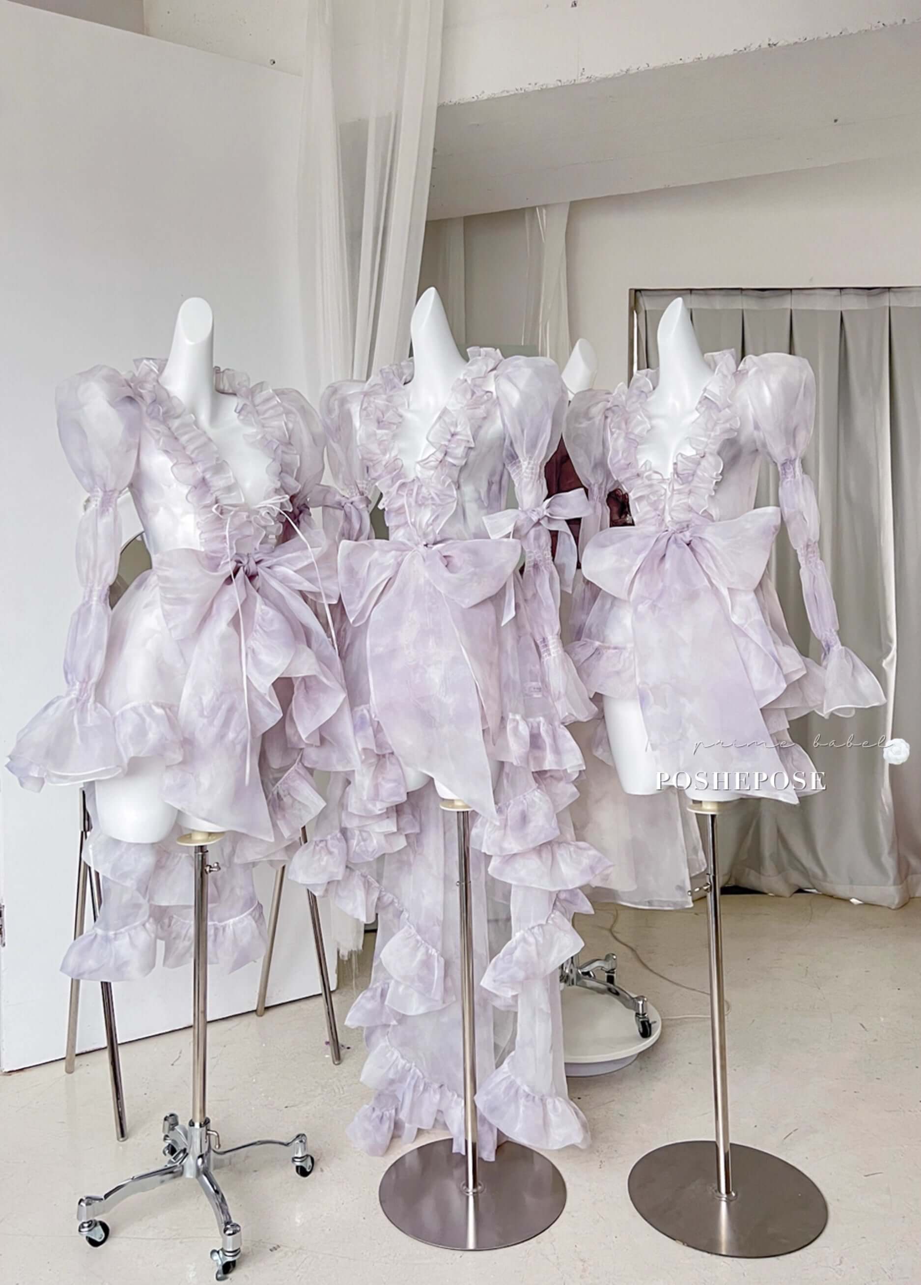 Innocent Spirit Iris Outer Cape in lilac organza with puff sleeves and ruffle trim by Poshepose Global