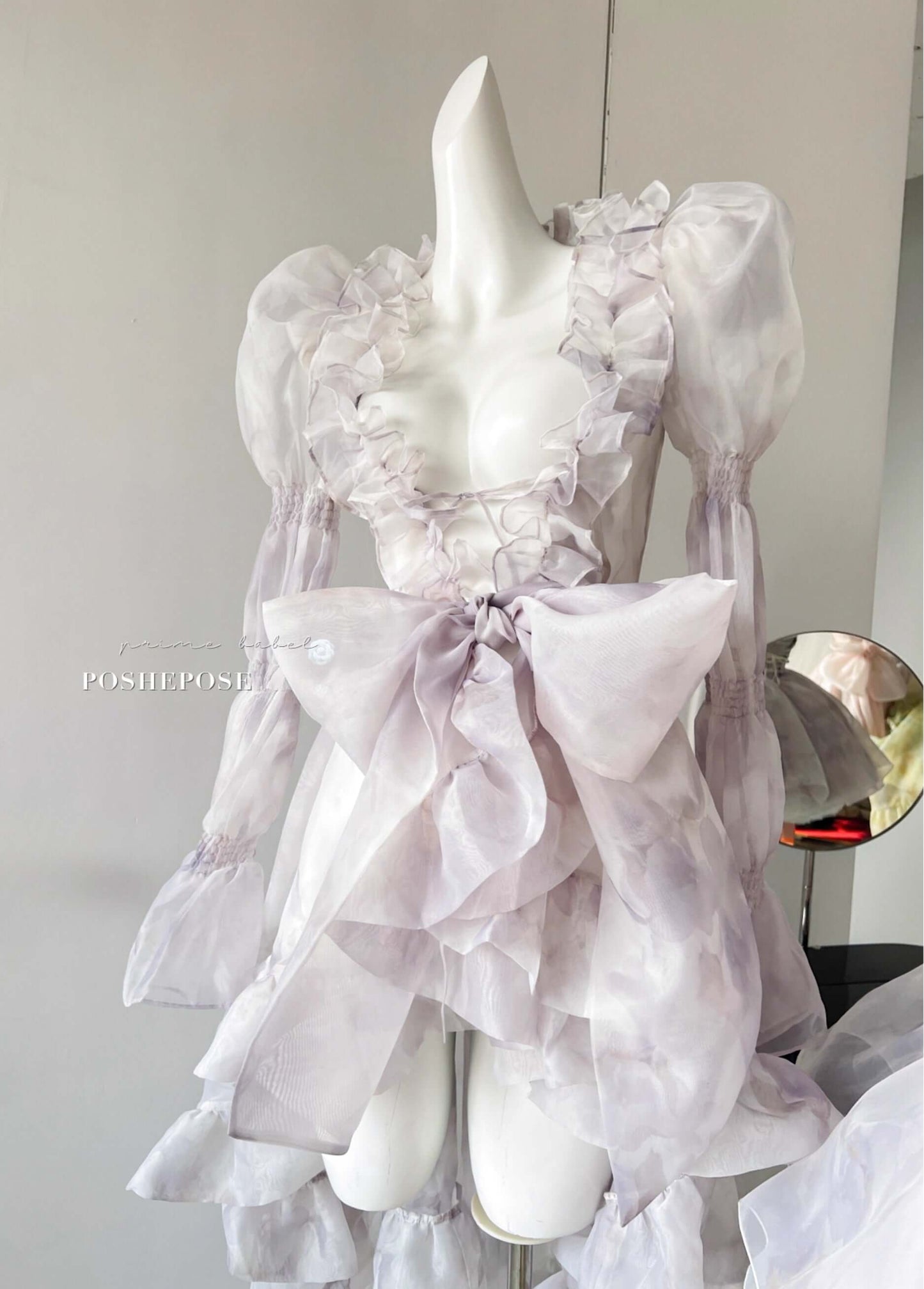 Ethereal lolita outer cape with sheer puff sleeves and pastel ruffles from Poshepose.