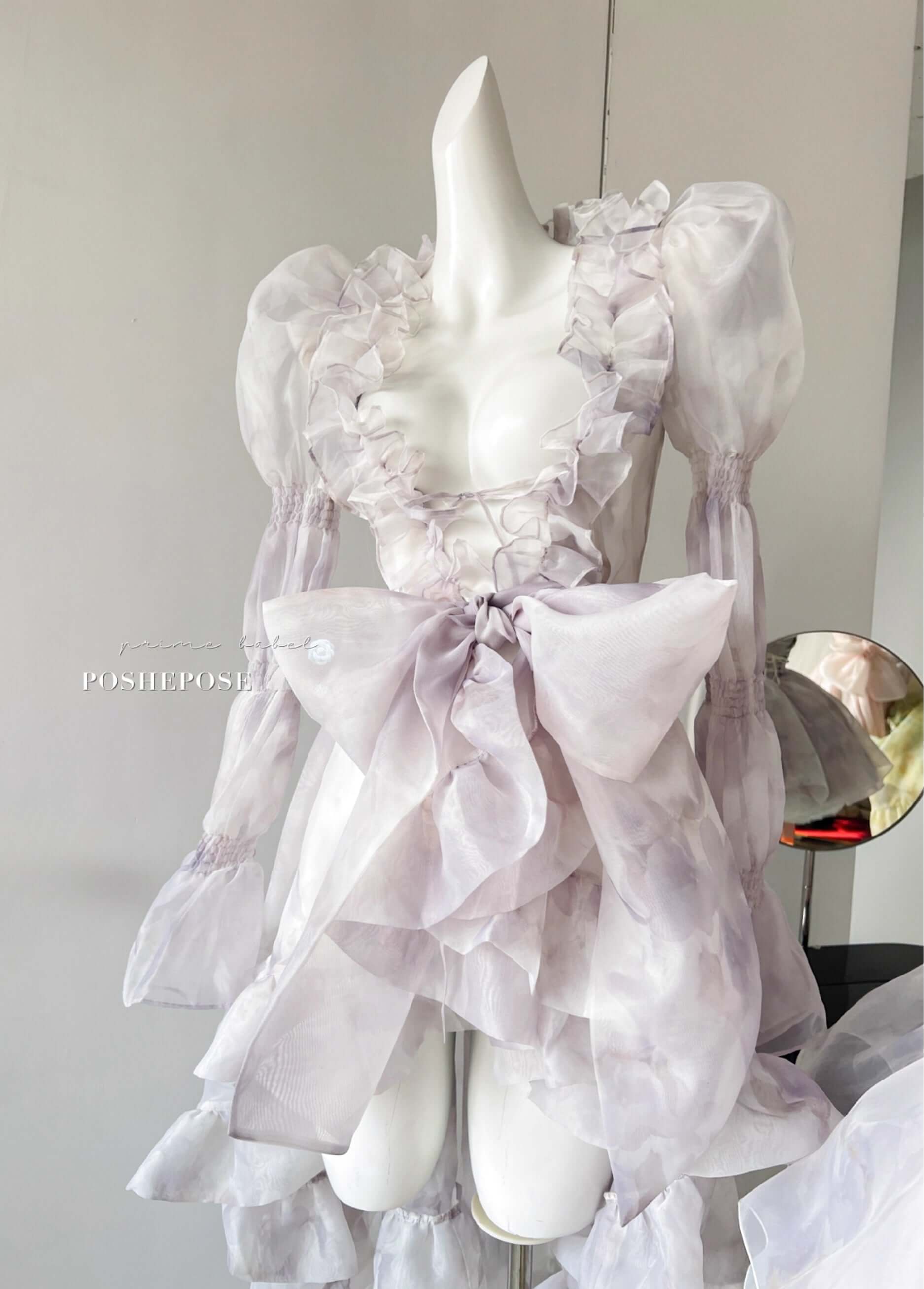 Ethereal lolita outer cape with sheer puff sleeves and pastel ruffles from Poshepose.