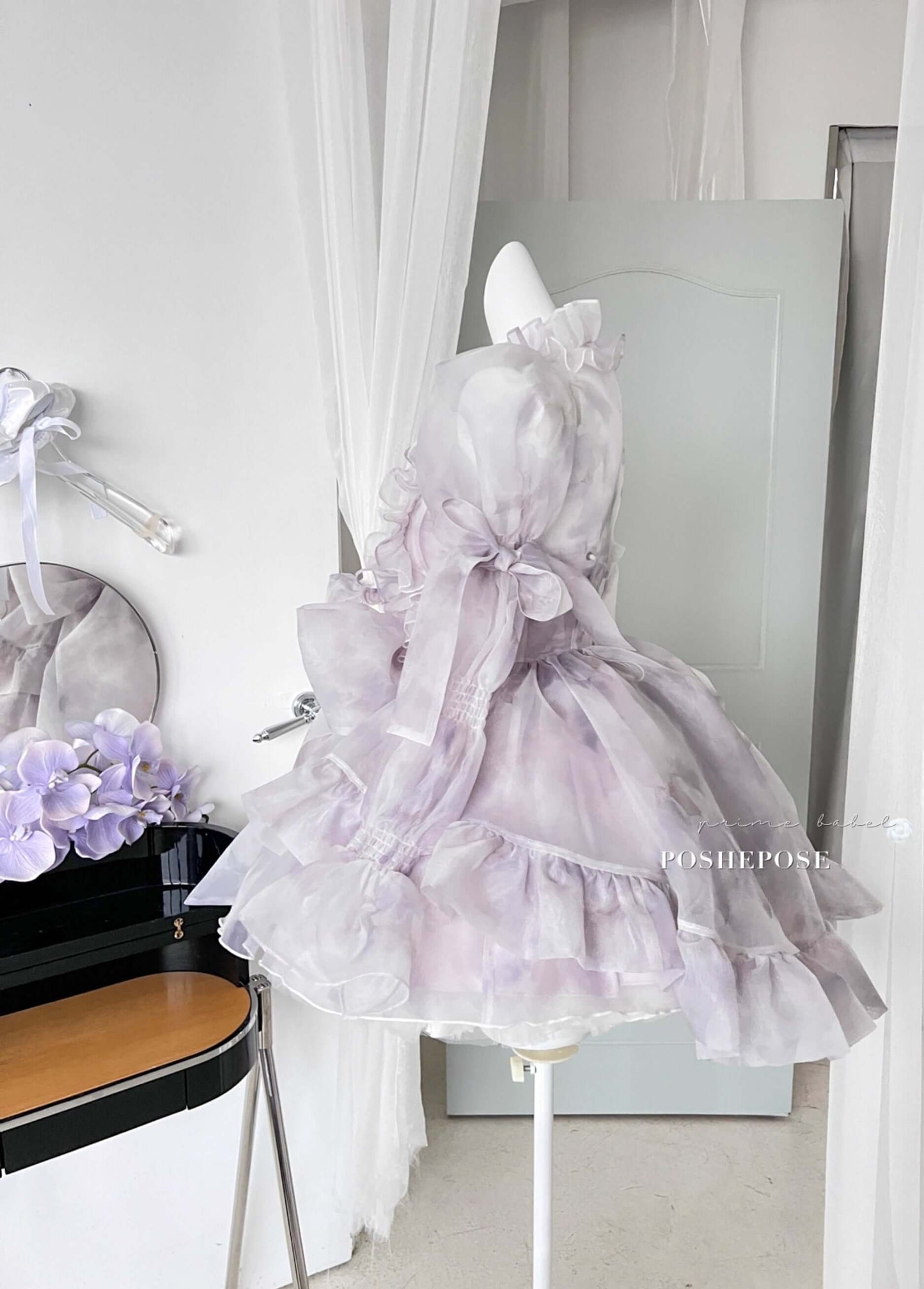 Innocent Spirit Iris pastel dress featuring puff sleeves and long ruffled hemline.