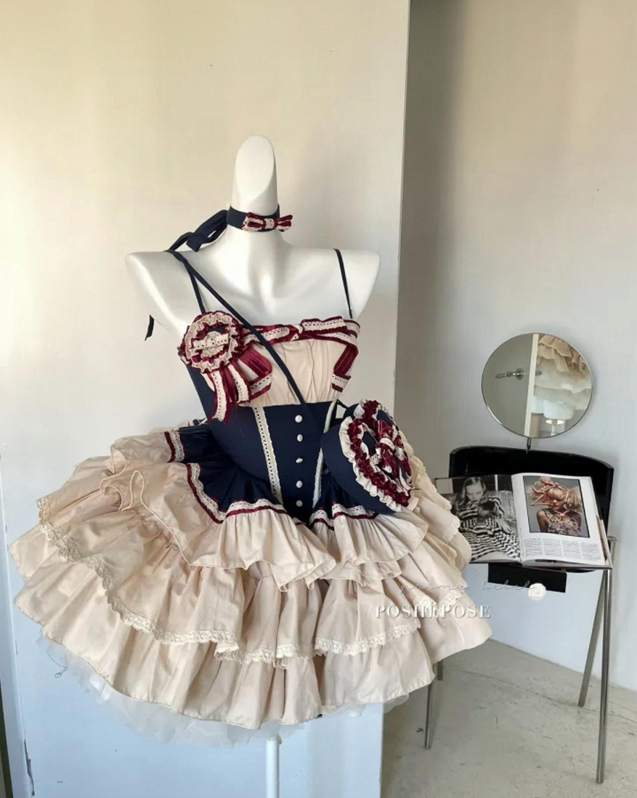 Vintage-inspired cream and navy dress set with heart purse and ruffled skirt by Poshepose.