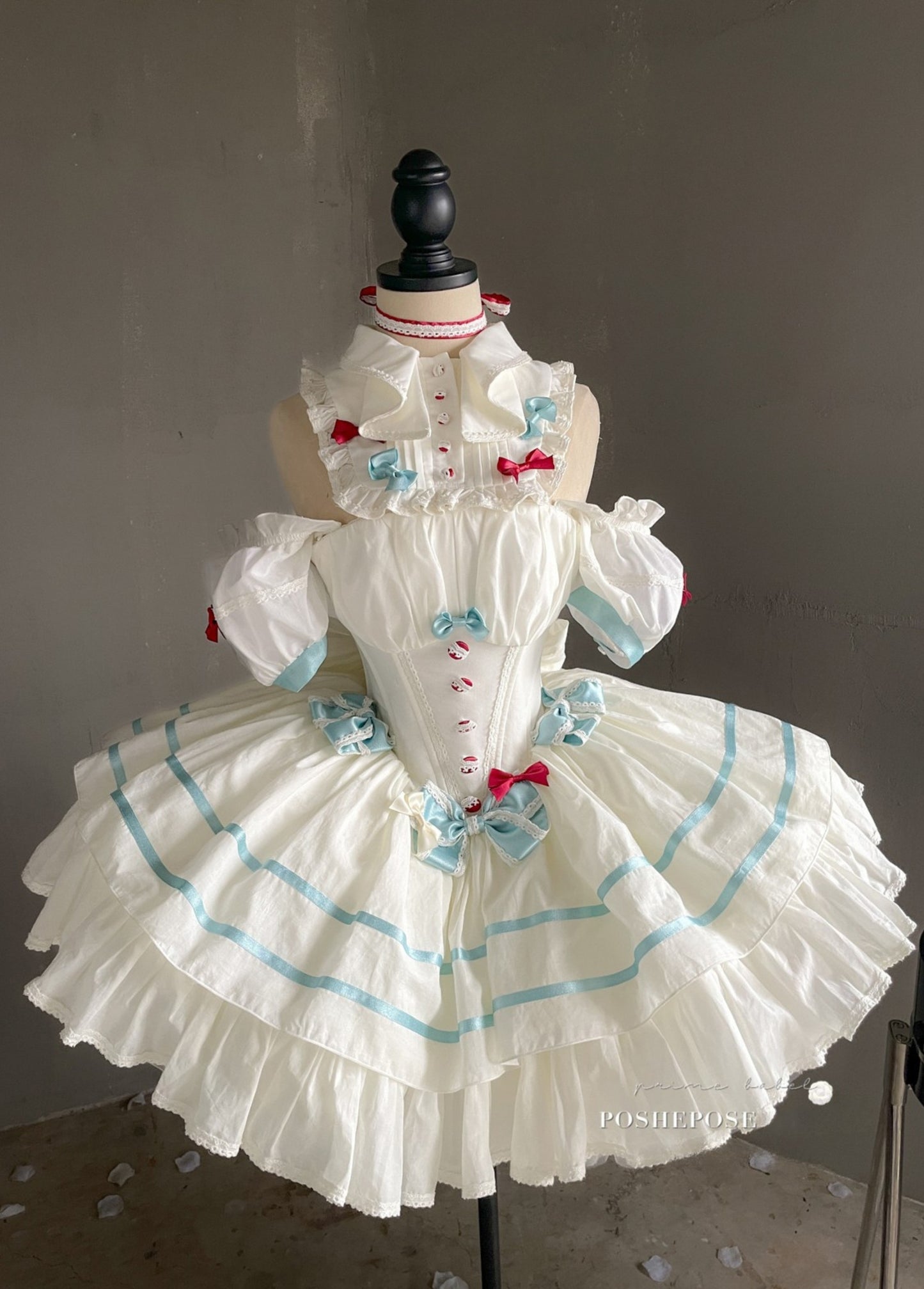 Elegant Lolita fashion gown with corset design and bow accents.