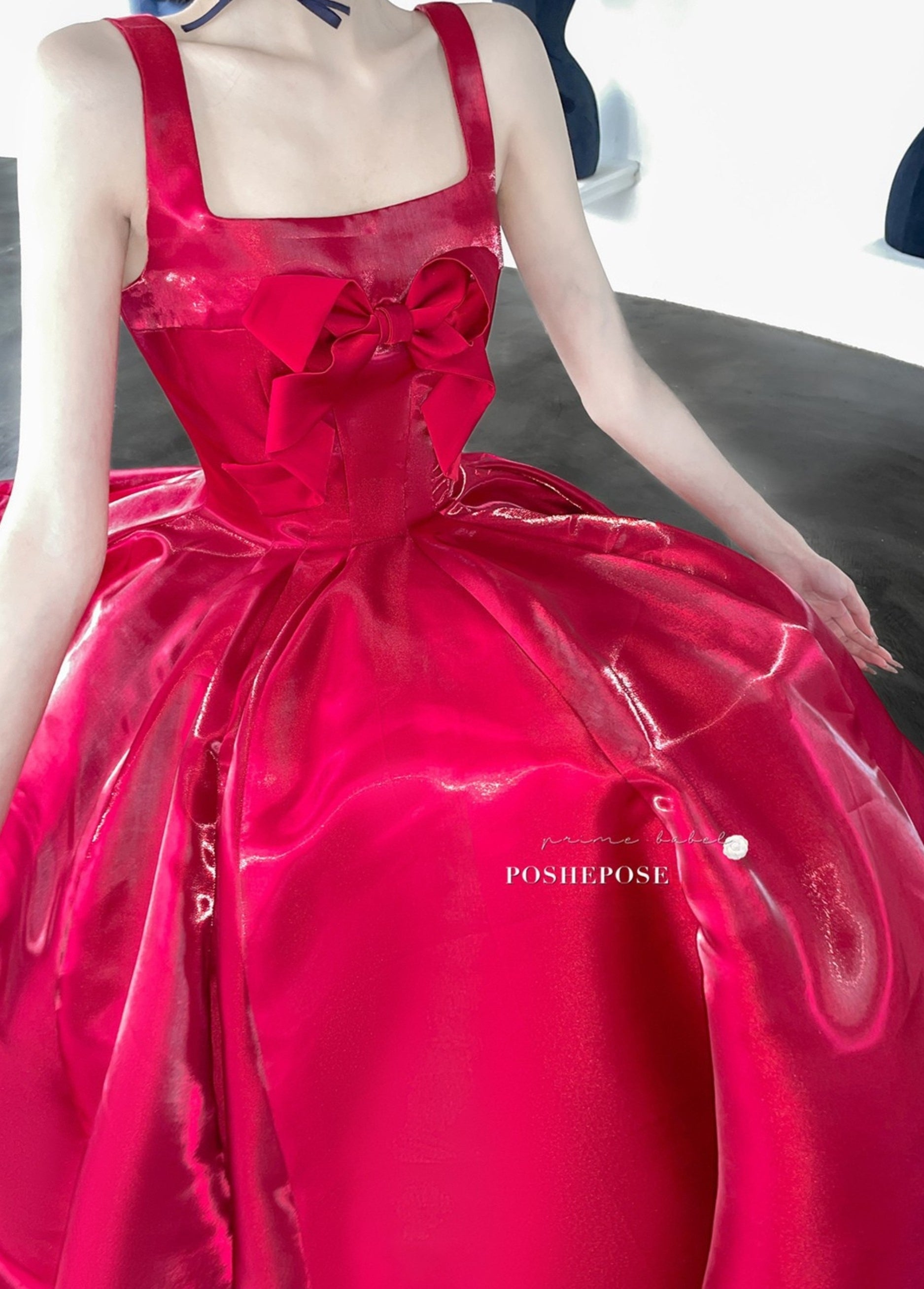 Satin red fairytale dress symbolizing joy and power