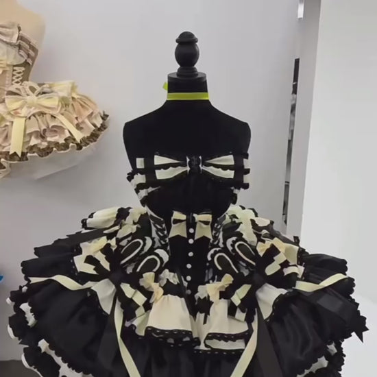 Sweet Dream Black Dress worn by model, black and yellow idol-style Lolita outfit.