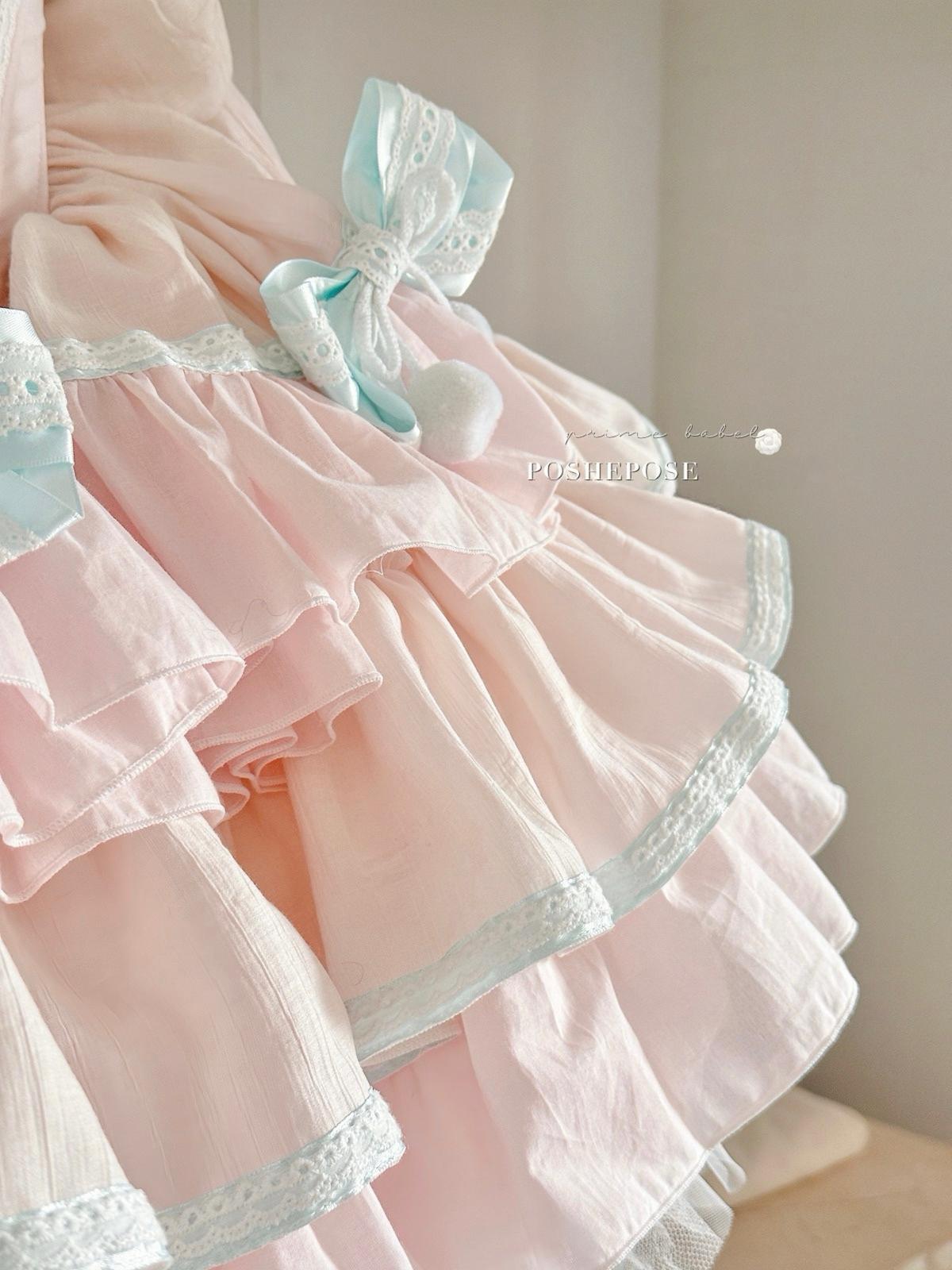 Princess-style mint lullababy dress with corset waist and ruffled lace.